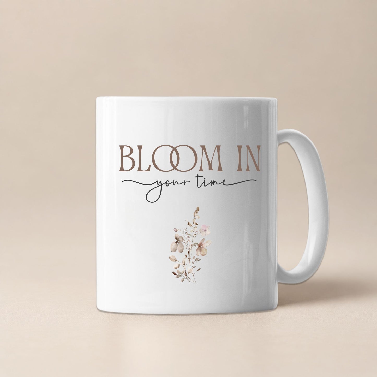 Bloom In Your Time motivational mug by Momentum Prints, front view on a soft beige background with minimalist floral design and elegant typography.