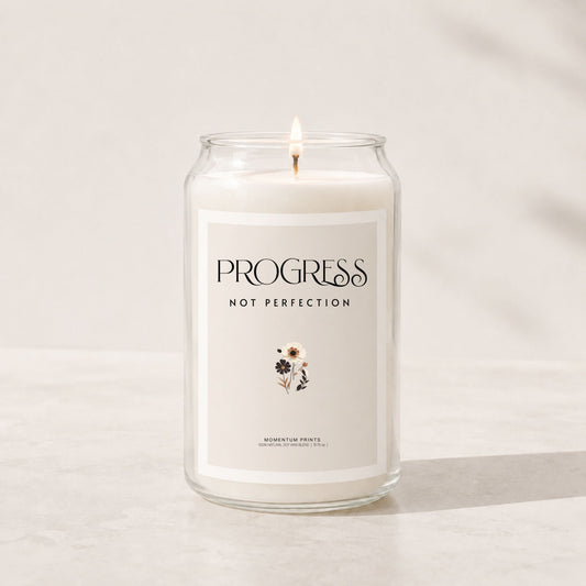 Minimalist luxury soy candle with a blank light beige label in a clear glass jar, styled in a soft neutral setting with warm natural lighting and clean spa-inspired aesthetics.