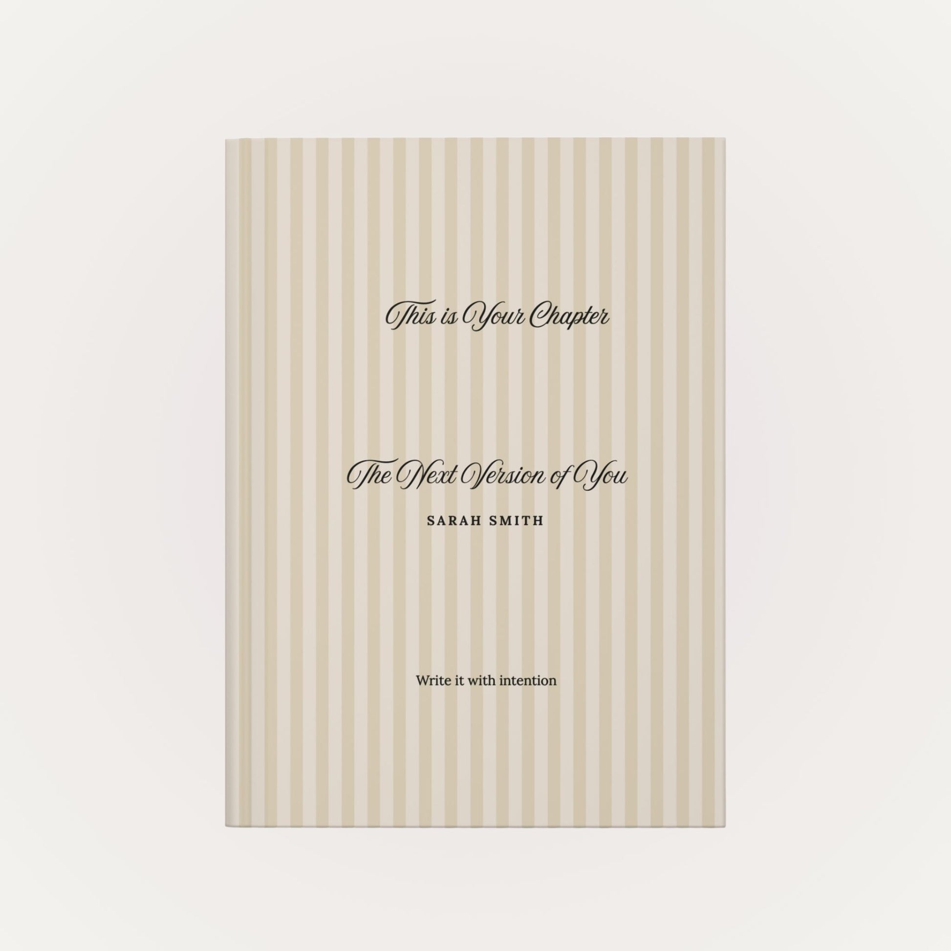 Front view of personalized hardcover journal with beige striped cover and custom name on a clean neutral background by Momentum Prints.